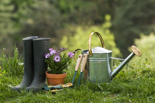 Professional garden maintenance tasks in Barbican including pruning and weeding